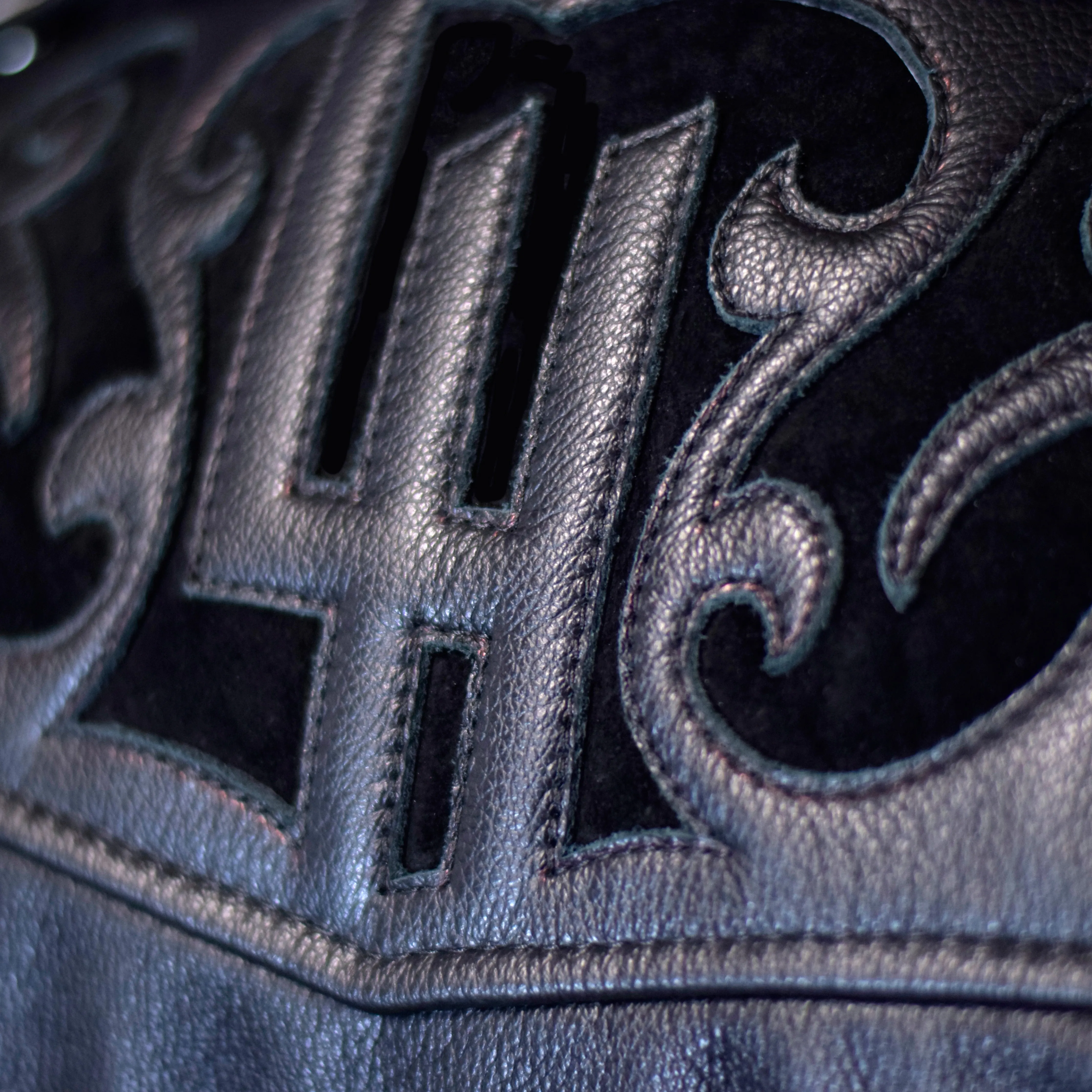Men's Black Biker Leather Jacket, Natural Python trims.