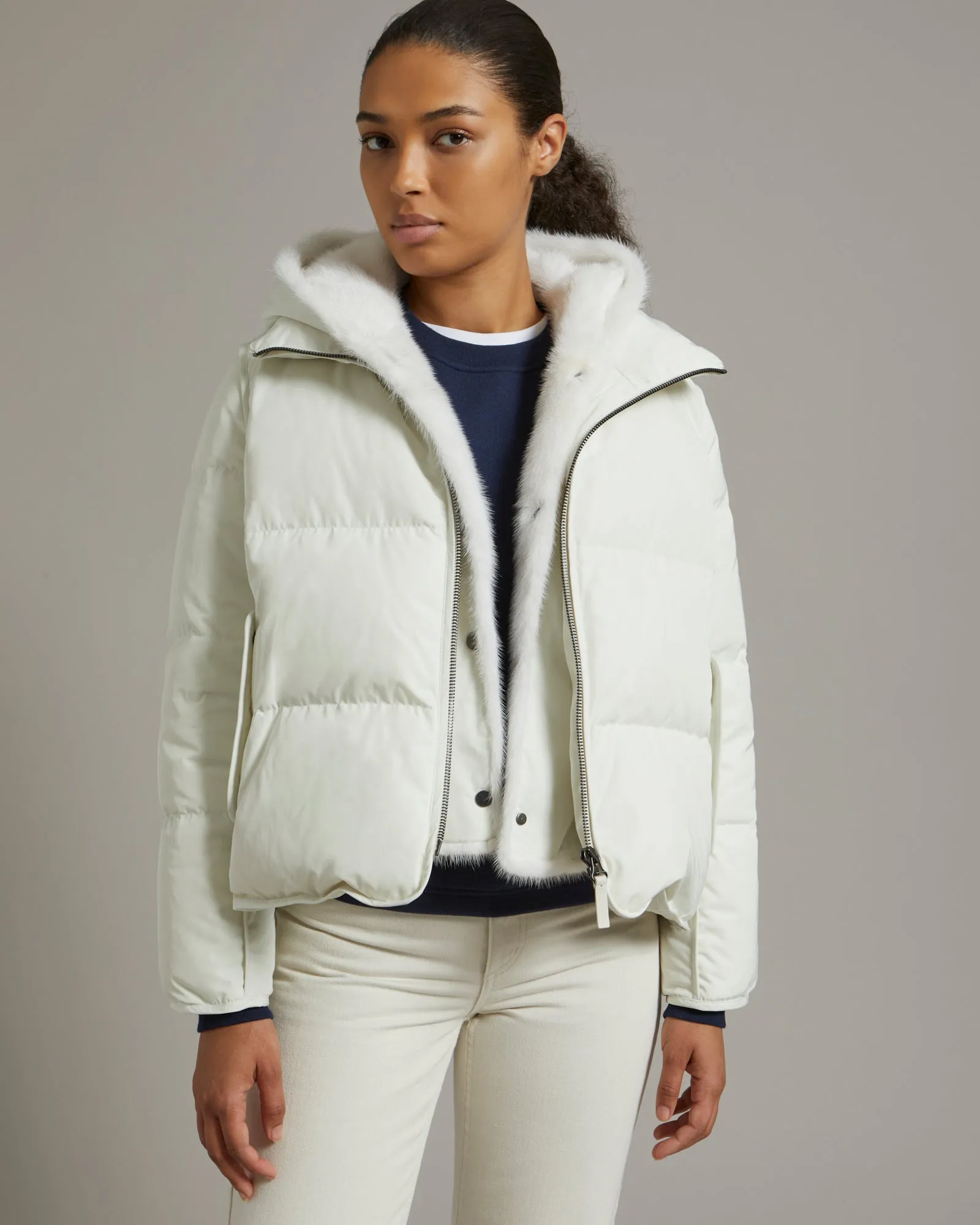 "A" line down jacket in technical fabric with long-haired mink hooded bib