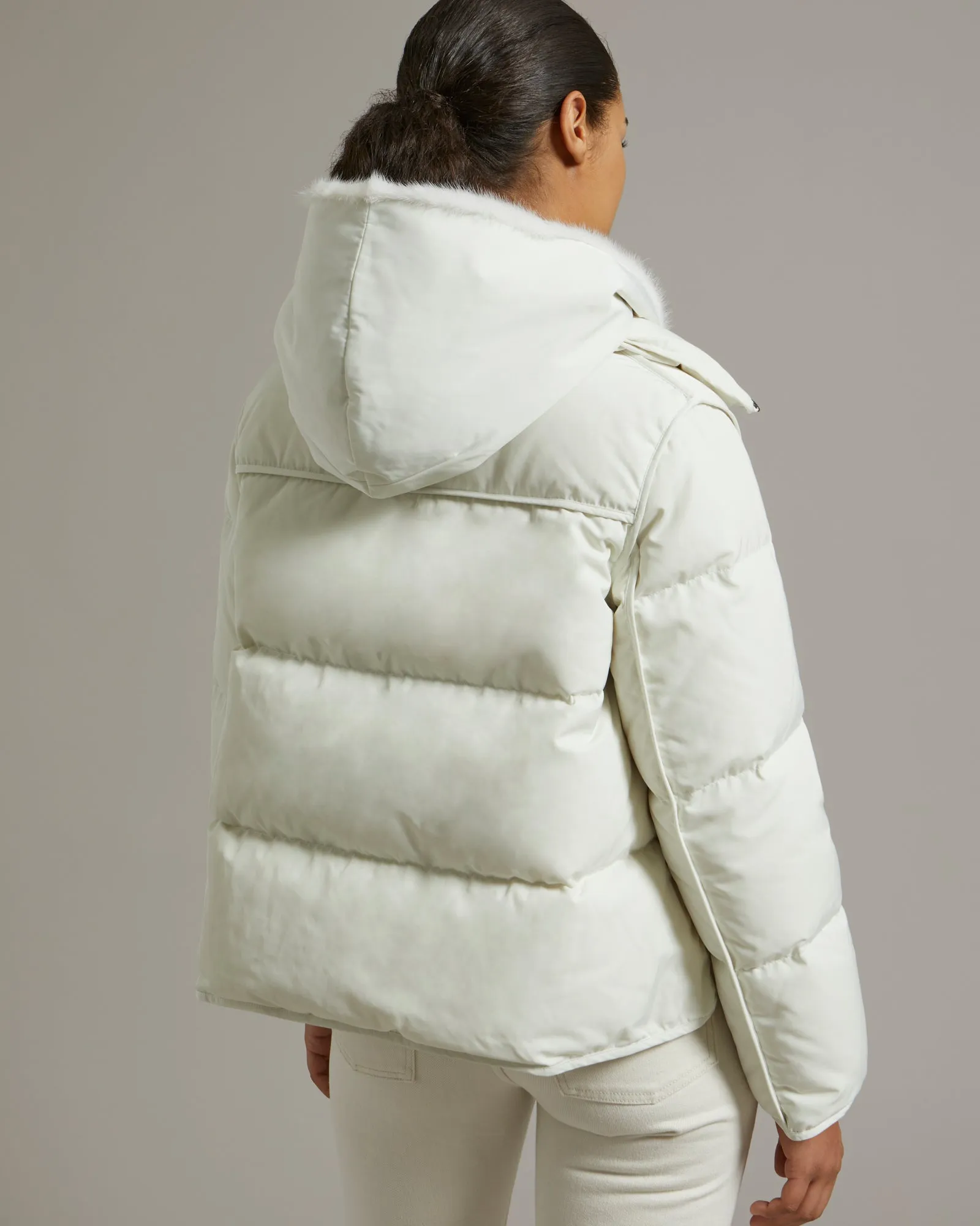 "A" line down jacket in technical fabric with long-haired mink hooded bib