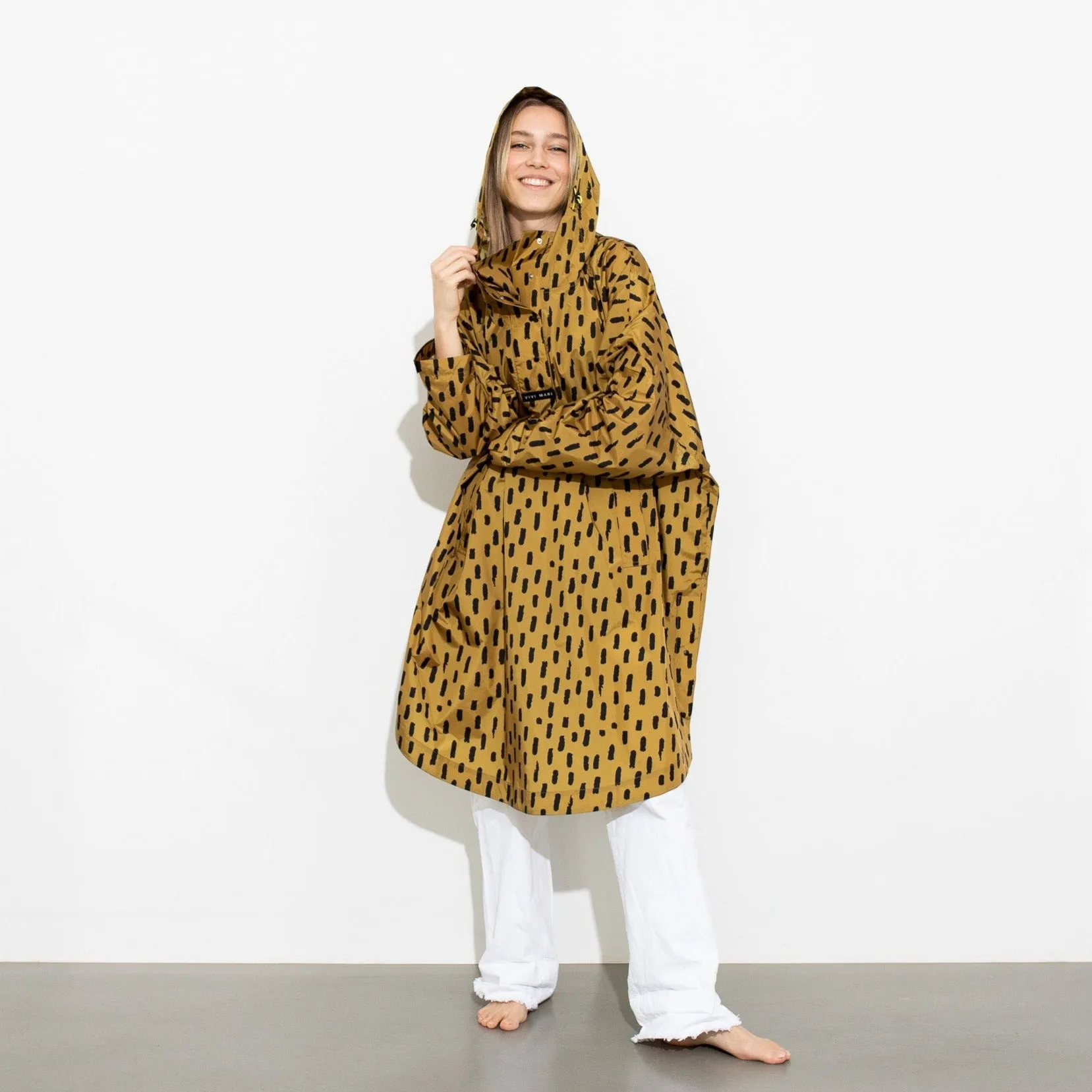 Raincoat drops mustard/black