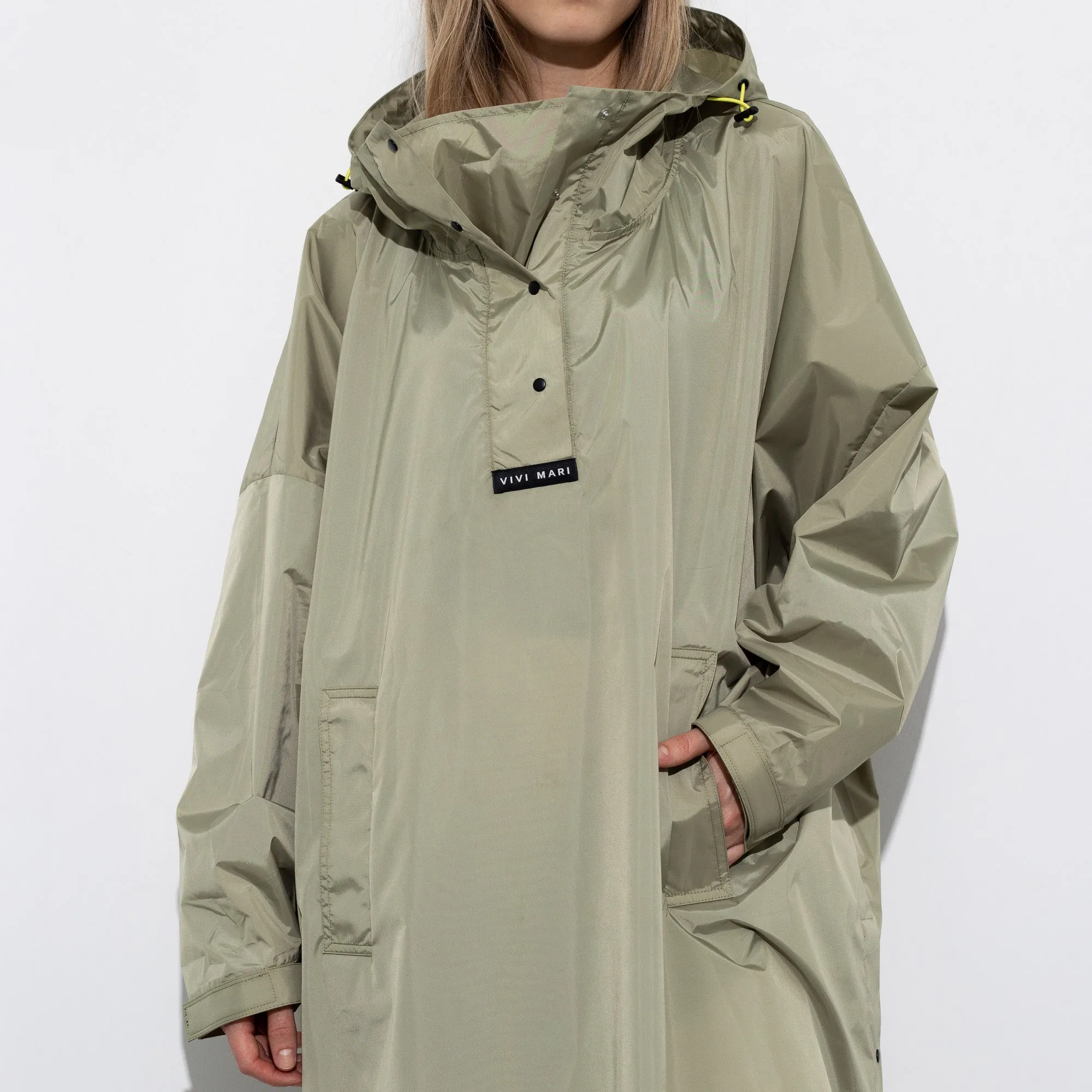 Raincoat solid pale olive